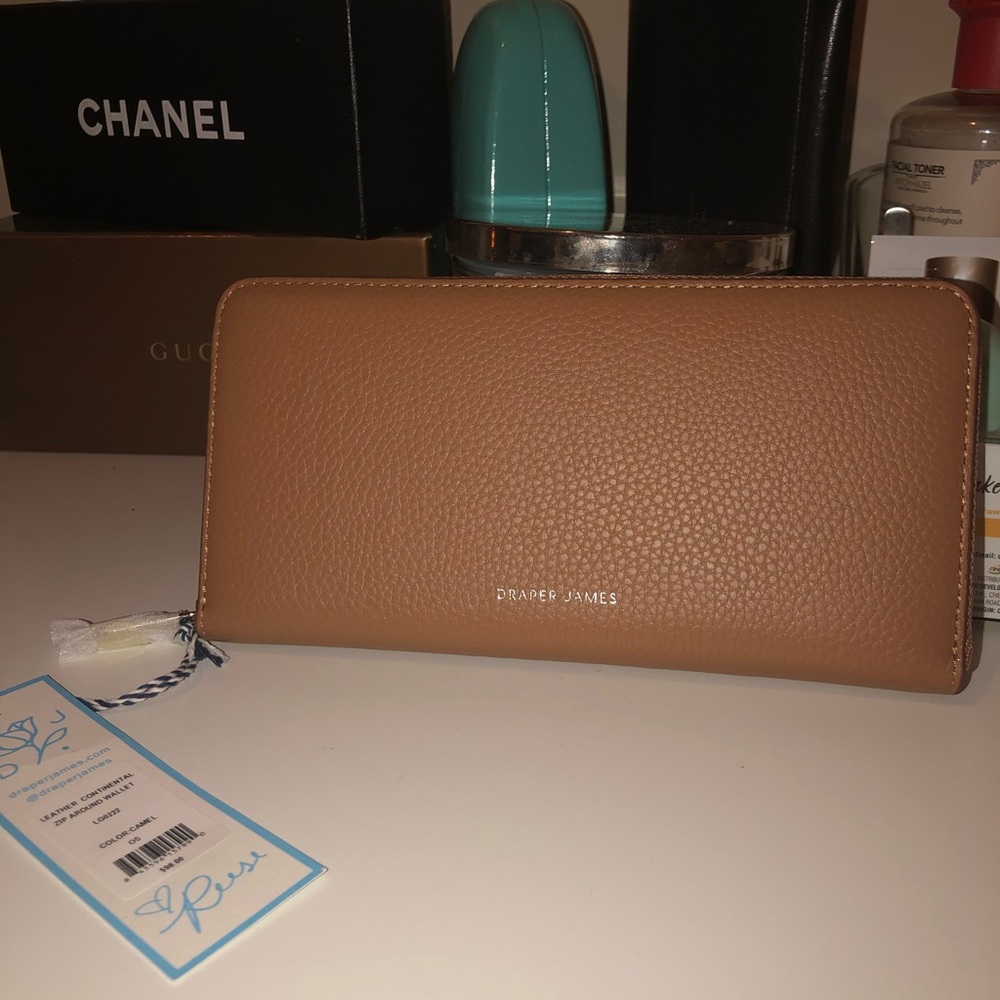Band new with tags, Draper James camel wallet. 7.5 inches long